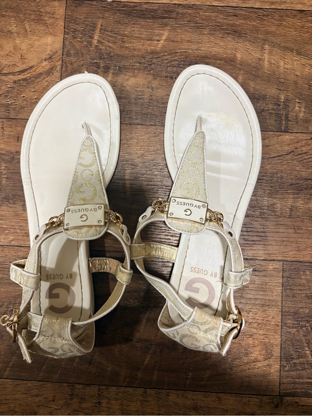 GUESS White & Gold Logo T-Strap Sandals with Chain Accent